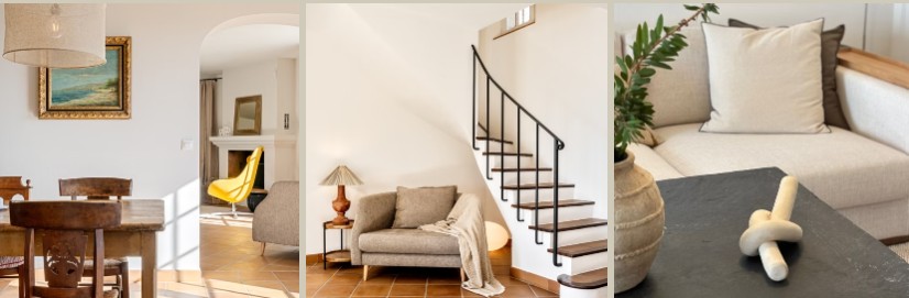 A rustic dining table opening onto the yellow-chaired living room, the staircase beside a cosy reading nook, and a coffee table styled with a stone vase