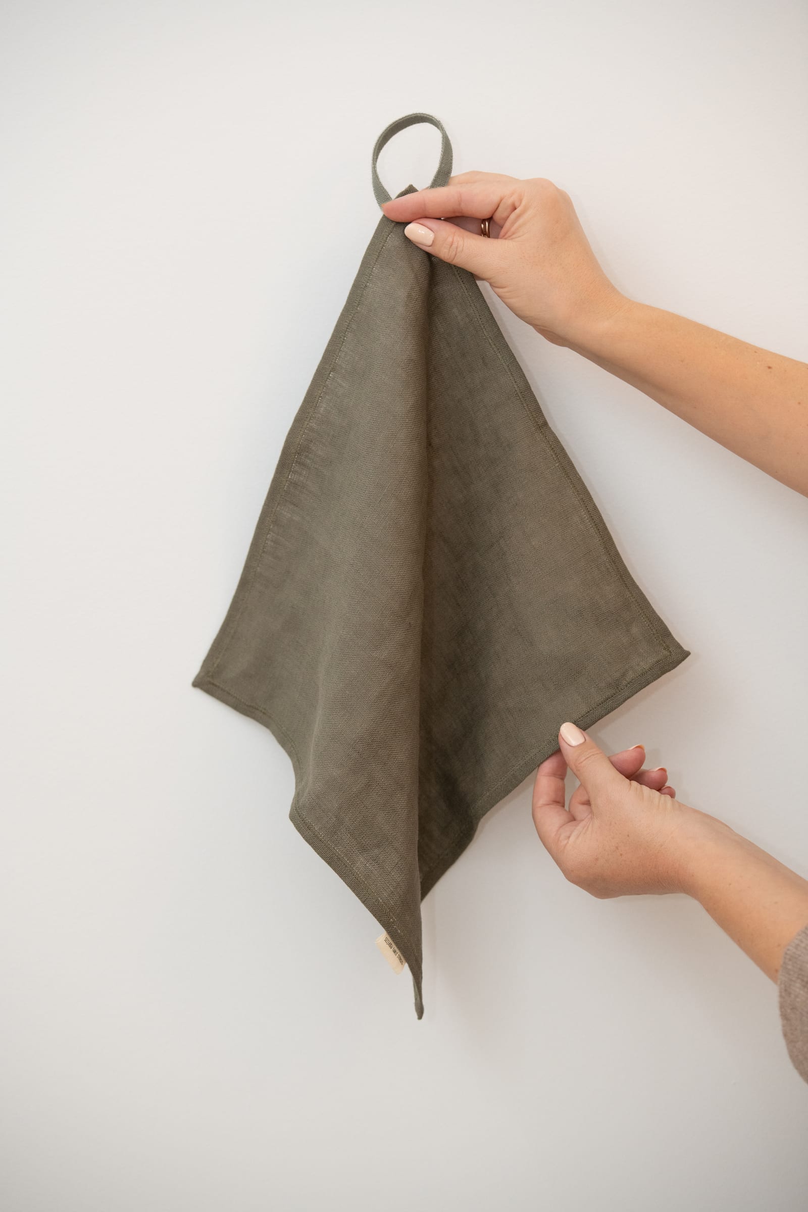 Earthy CLAY-green linen kitchen towel with a hand-stitched hanging hook